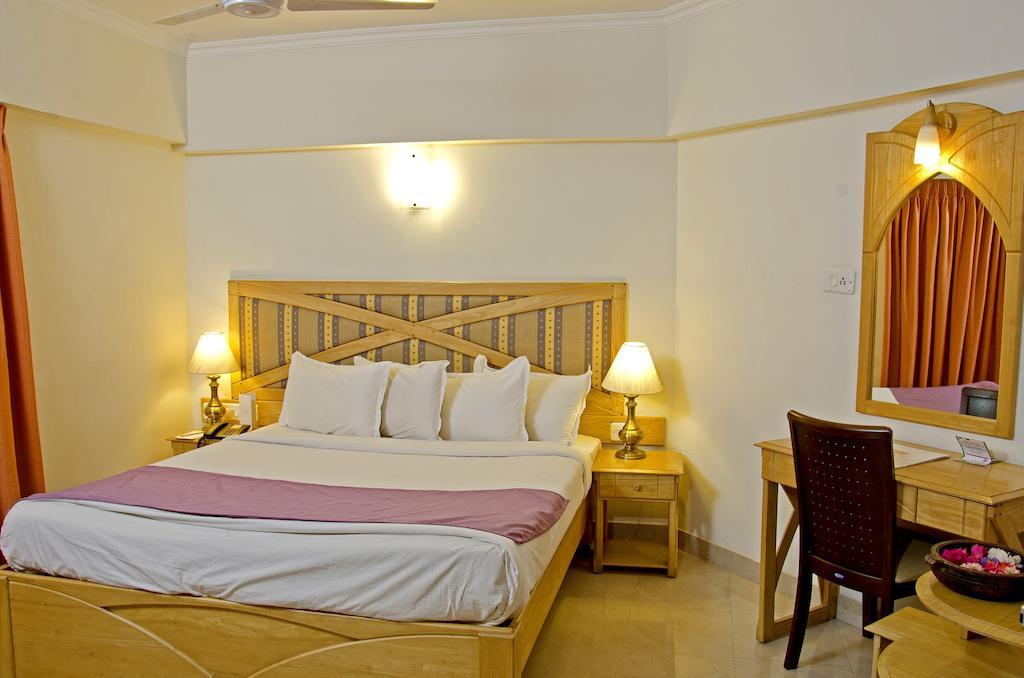 Lotus 8 Hotel Недумбассері Номер фото